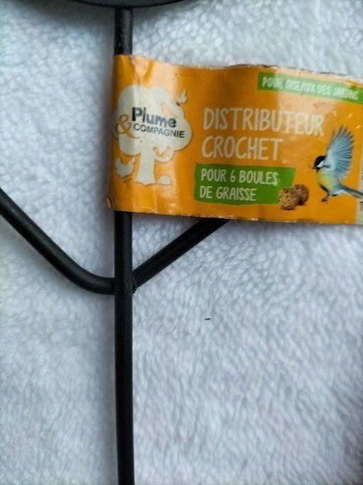 Crochet distributeur pour oiseaux